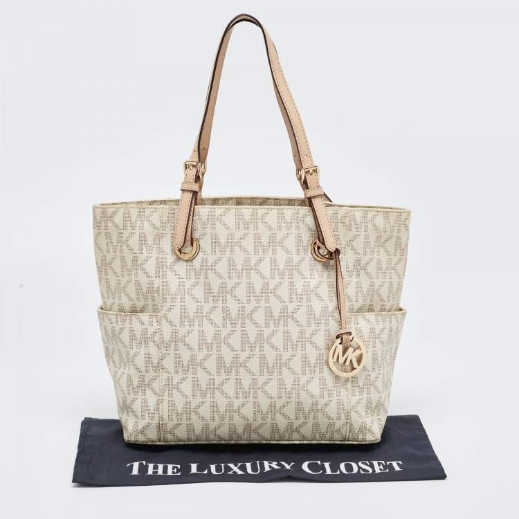 مملوكة مسبقًا MICHAEL Michael Kors Off White/Beige Signature Coated Canvas and Leather Jet Set East West Tote