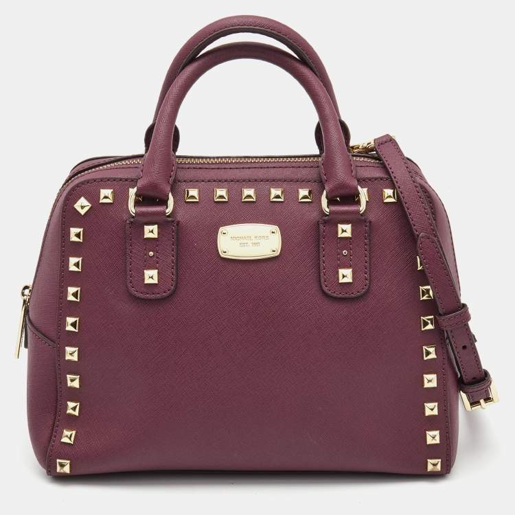Buy the Michael Kors Purple Studded Leather Handbag | GoodwillFinds