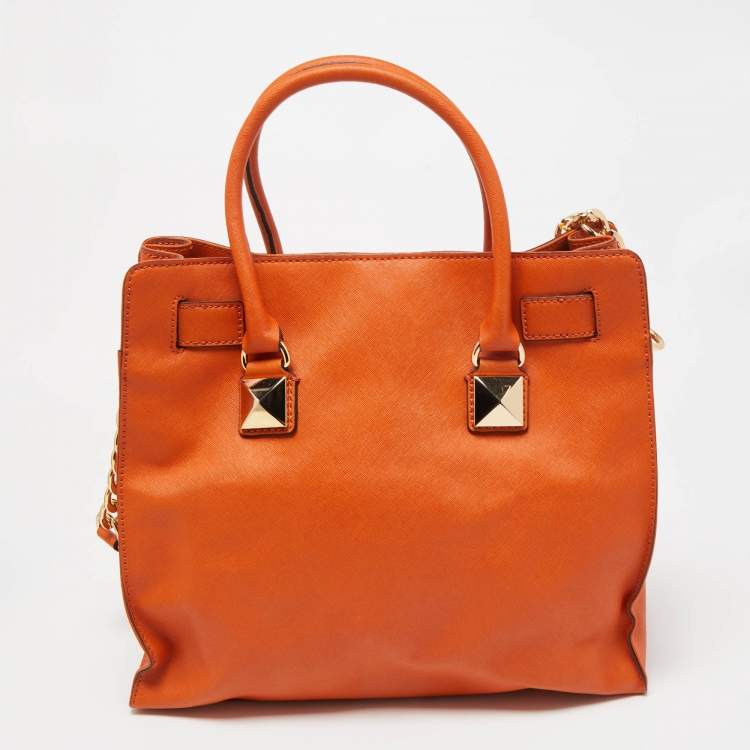 Pre Owned MICHAEL Michael Kors Orange Leather Studded Large North South Hamilton Tote