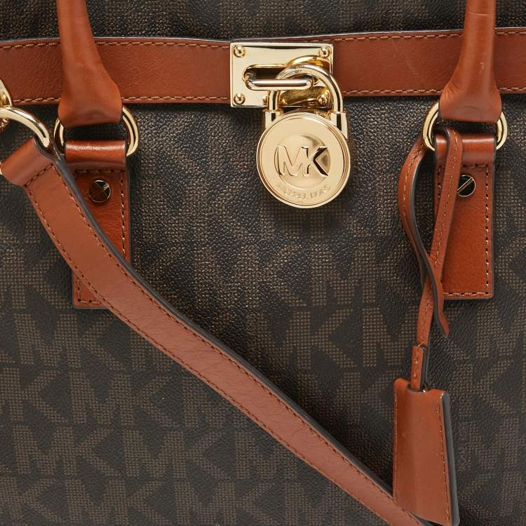 Pre Owned MICHAEL Michael Kors Brown Signature Coated Canvas Large North South Hamilton Tote