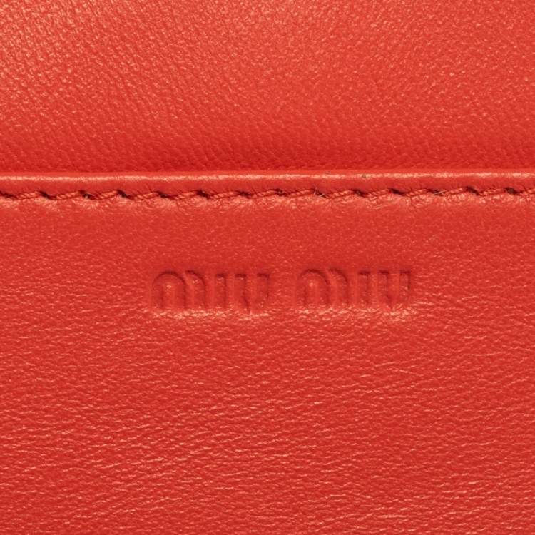Pre Owned Miu Miu Coral Orange Vernice Leather Bow Flap Continental Wallet