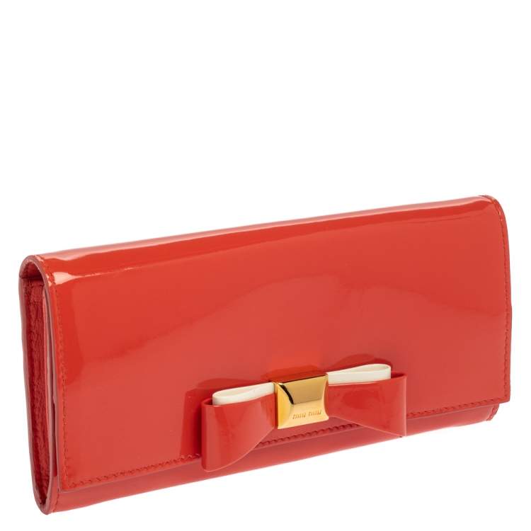 Pre Owned Miu Miu Coral Orange Vernice Leather Bow Flap Continental Wallet