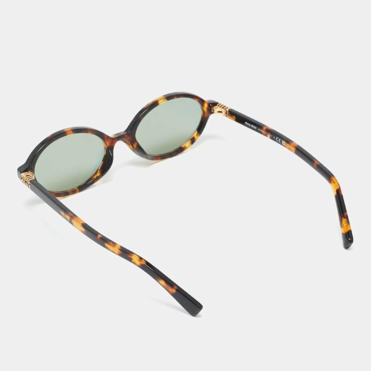 Pre Owned نظارة شمسية ميو ميو SMU04Z بنية سلحفاة ريجارد بيضاوية