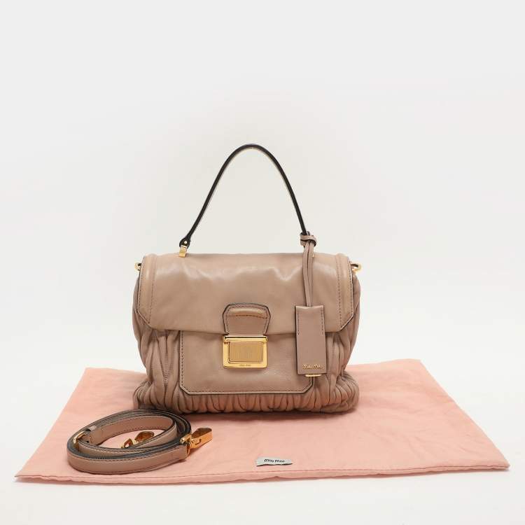 Pre Owned Miu Miu Beige Matelasse Leather Push Lock Top Handle Bag