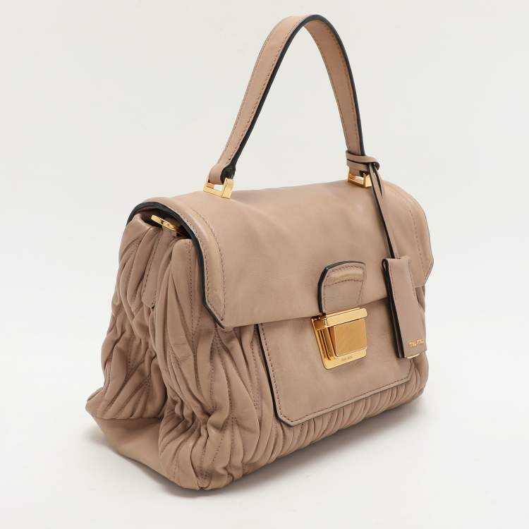Pre Owned Miu Miu Beige Matelasse Leather Push Lock Top Handle Bag