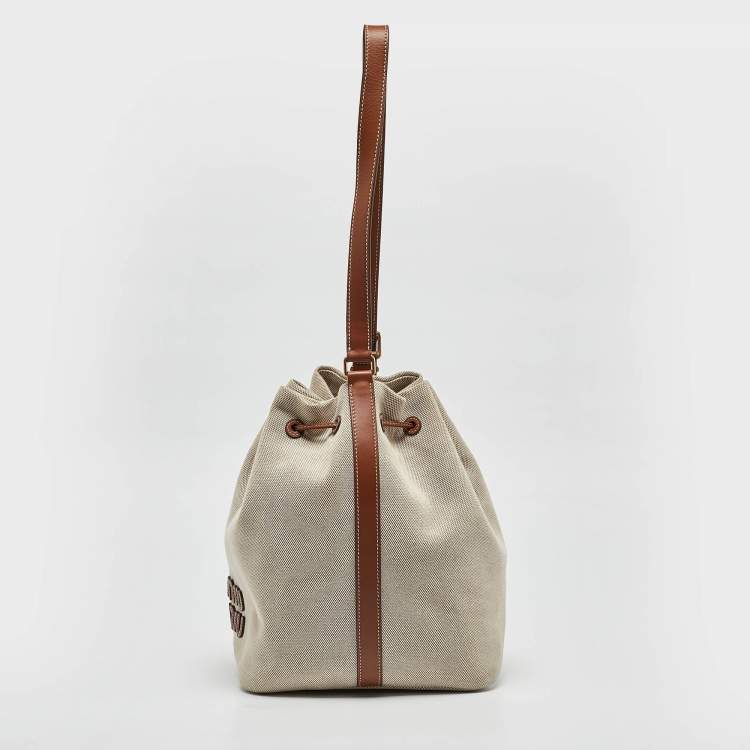 Pre Owned Miu Miu Brown/Natural Canvas Logo Drawstring Bucket Bag