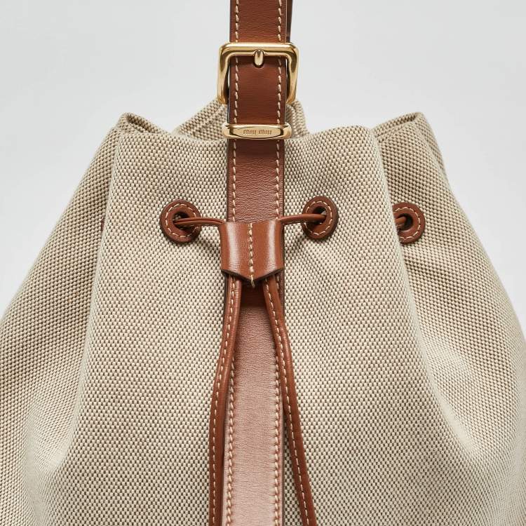 Pre Owned Miu Miu Brown/Natural Canvas Logo Drawstring Bucket Bag