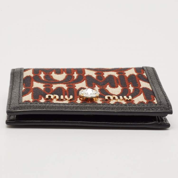 Pre Owned Miu Miu Black/Brown Monogram Canvas and Madras Leather Bifold Wallet