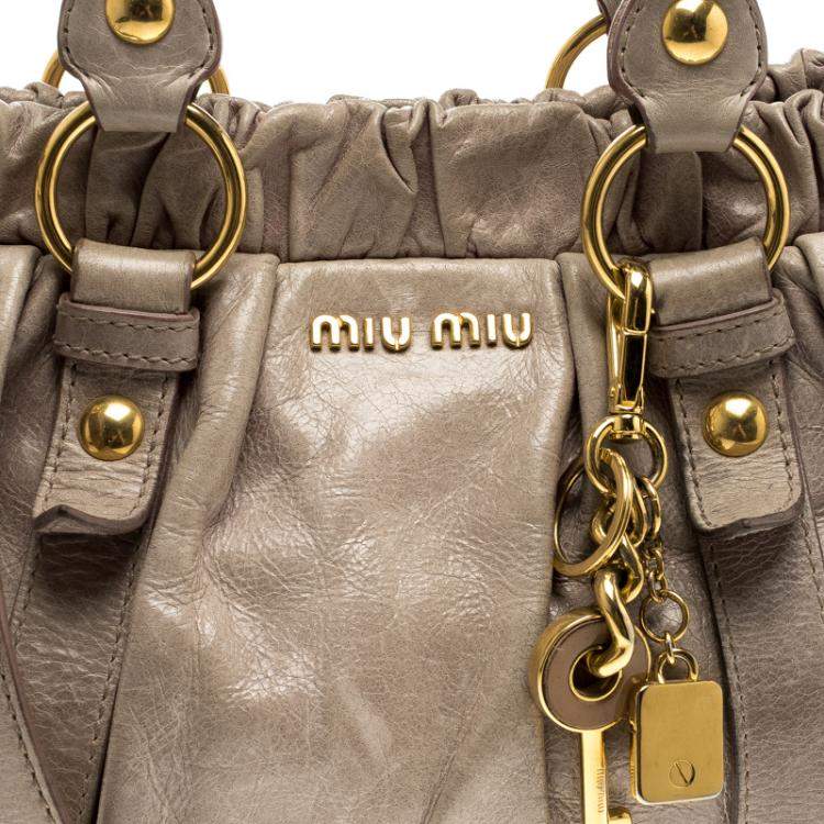 Pre Owned Miu Miu Beige Glazed Leather Luxe Ruched Top Handle Bag