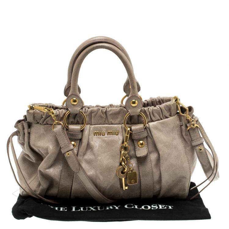 Pre Owned Miu Miu Beige Glazed Leather Luxe Ruched Top Handle Bag