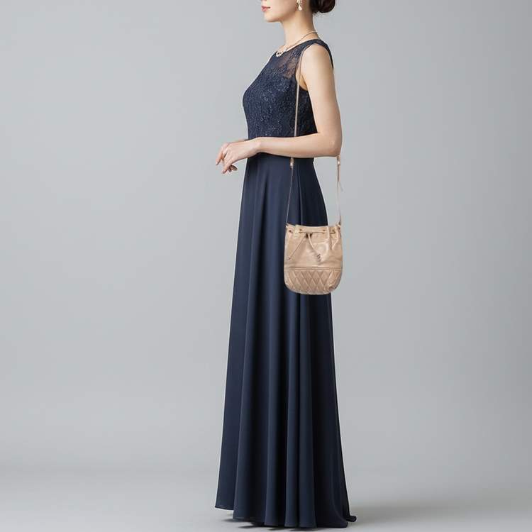 مملوكة مسبقًا Miu Miu Beige Vitello Shine Leather Drawstring Bucket Bag