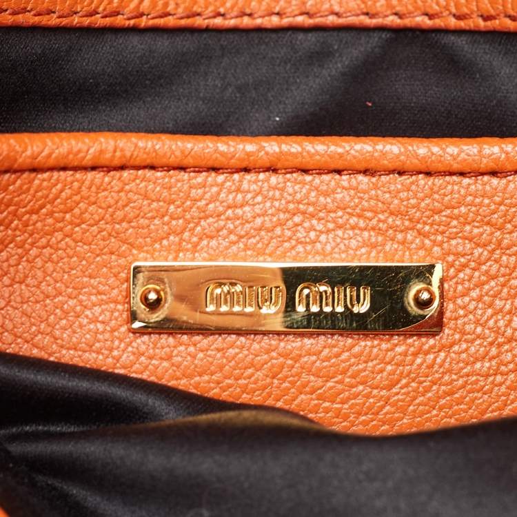 Pre Owned حقيبة ميو ميو جلد مادراس برتقالي بقفل ضاغط بقلاب بيد علوية