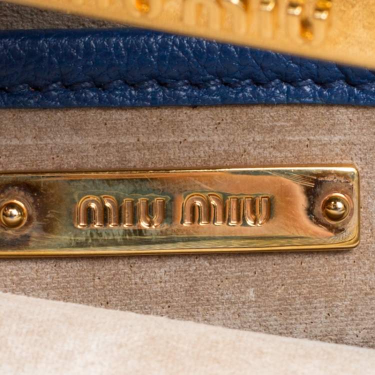 Pre Owned Miu Miu Blue Pebbled Leather Madras Top Handle Bag