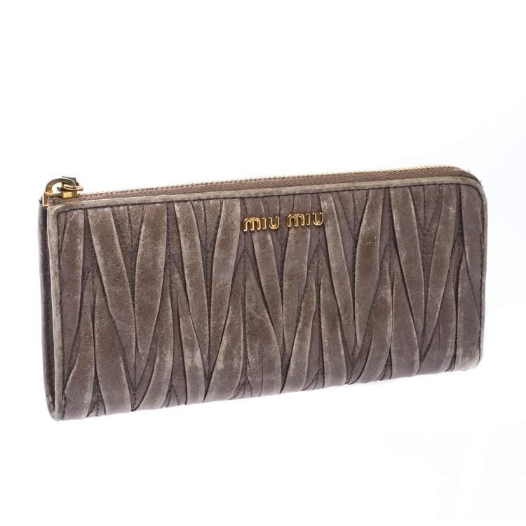 Pre Owned Miu Miu Dark Beige Matelassé Leather Continental Zip Wallet