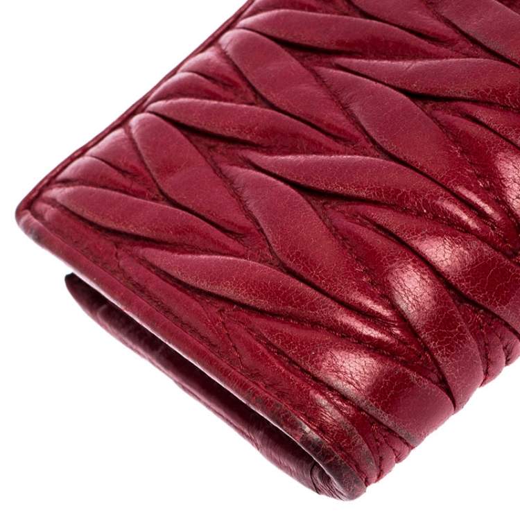 Pre Owned Miu Miu Dark Red Matelassé Leather Continental Zip Wallet