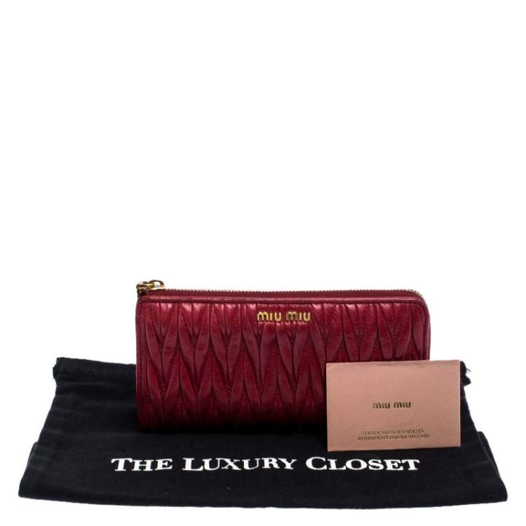 Pre Owned Miu Miu Dark Red Matelassé Leather Continental Zip Wallet
