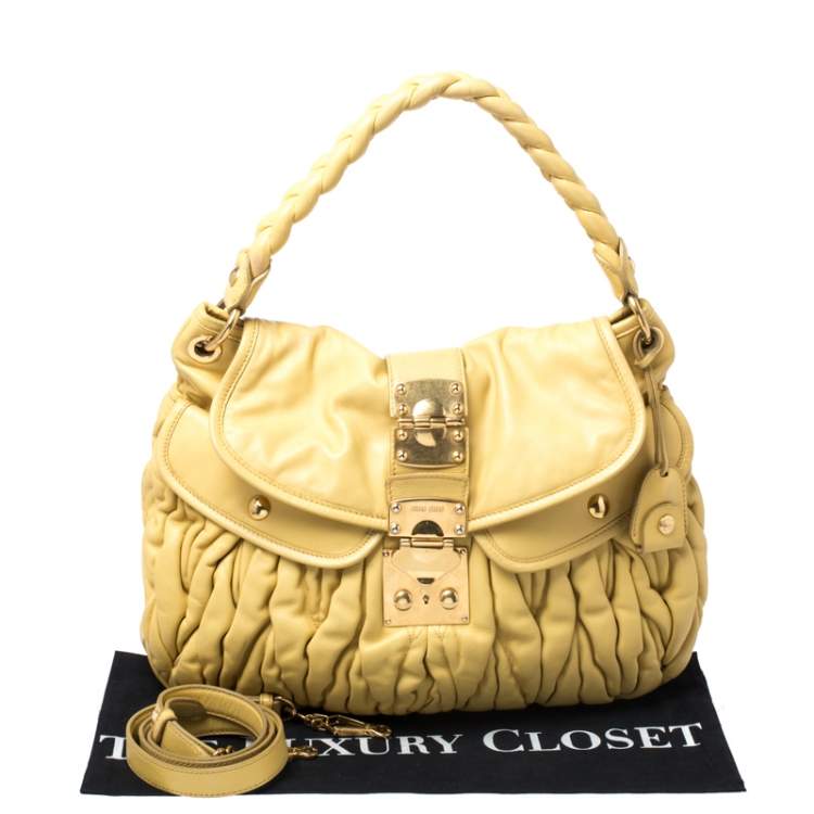 Pre Owned Miu Miu Yellow Matelassé Leather Coffer Hobo