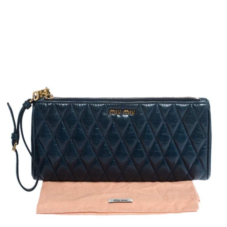 Pre Owned Miu Miu Blue Diamond Quilted Leather Zip Wristlet Clutch