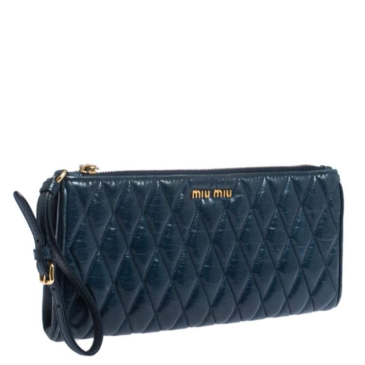 Pre Owned Miu Miu Blue Diamond Quilted Leather Zip Wristlet Clutch