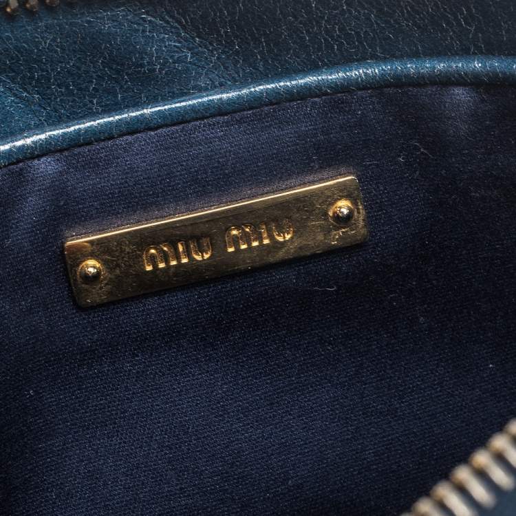 Pre Owned Miu Miu Blue Diamond Quilted Leather Zip Wristlet Clutch