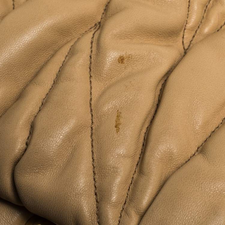 Pre Owned Miu Miu Beige Matelasse Leather Turnlock Top Handle Bag