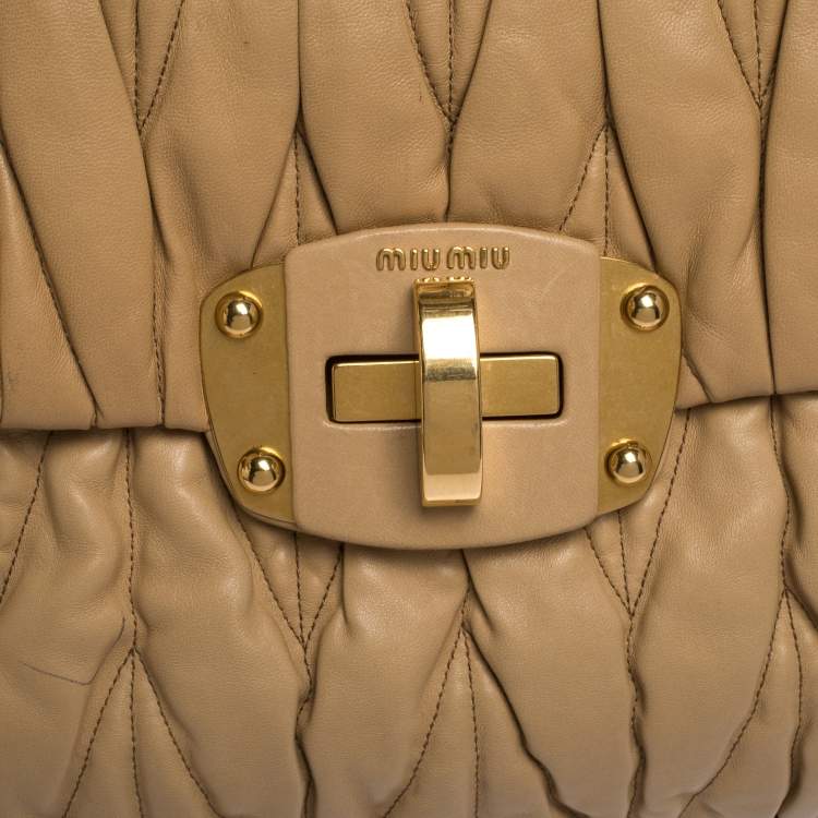 Pre Owned Miu Miu Beige Matelasse Leather Turnlock Top Handle Bag