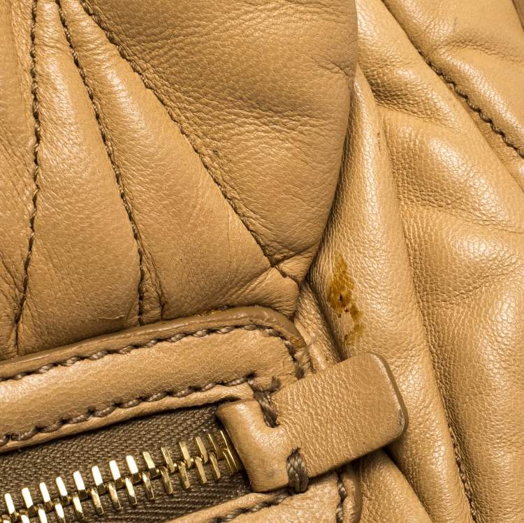 Pre Owned Miu Miu Beige Matelasse Leather Turnlock Top Handle Bag