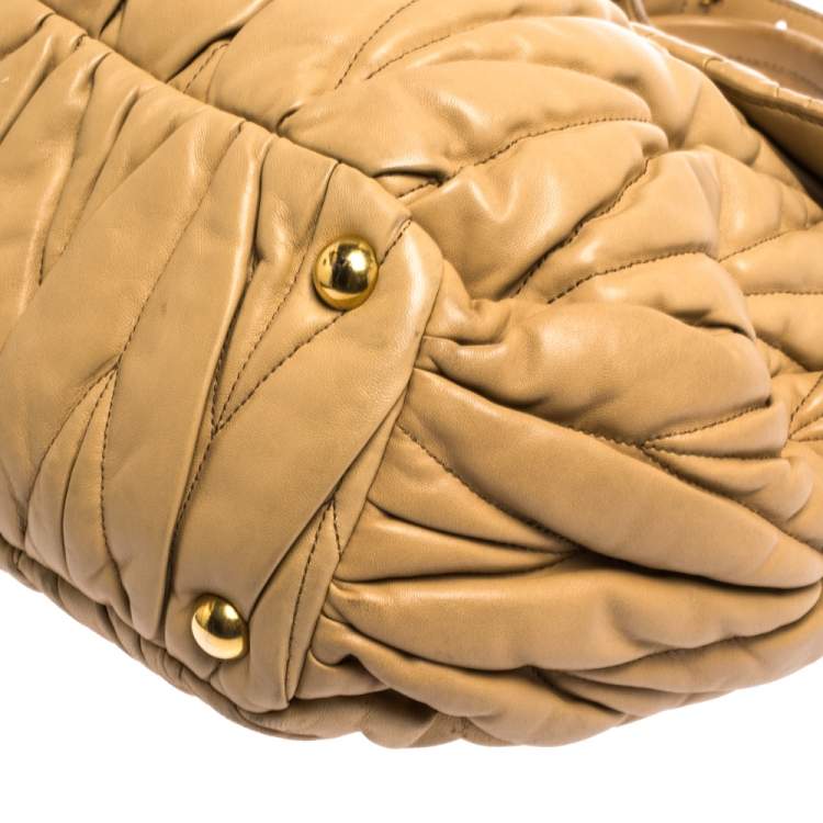 Pre Owned Miu Miu Beige Matelasse Leather Turnlock Top Handle Bag