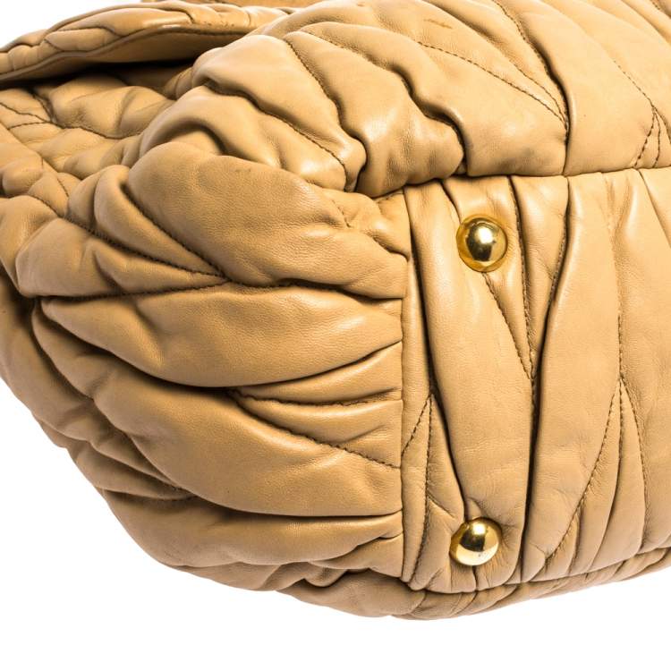Pre Owned Miu Miu Beige Matelasse Leather Turnlock Top Handle Bag