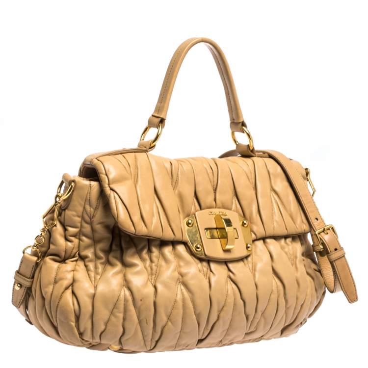 Pre Owned Miu Miu Beige Matelasse Leather Turnlock Top Handle Bag