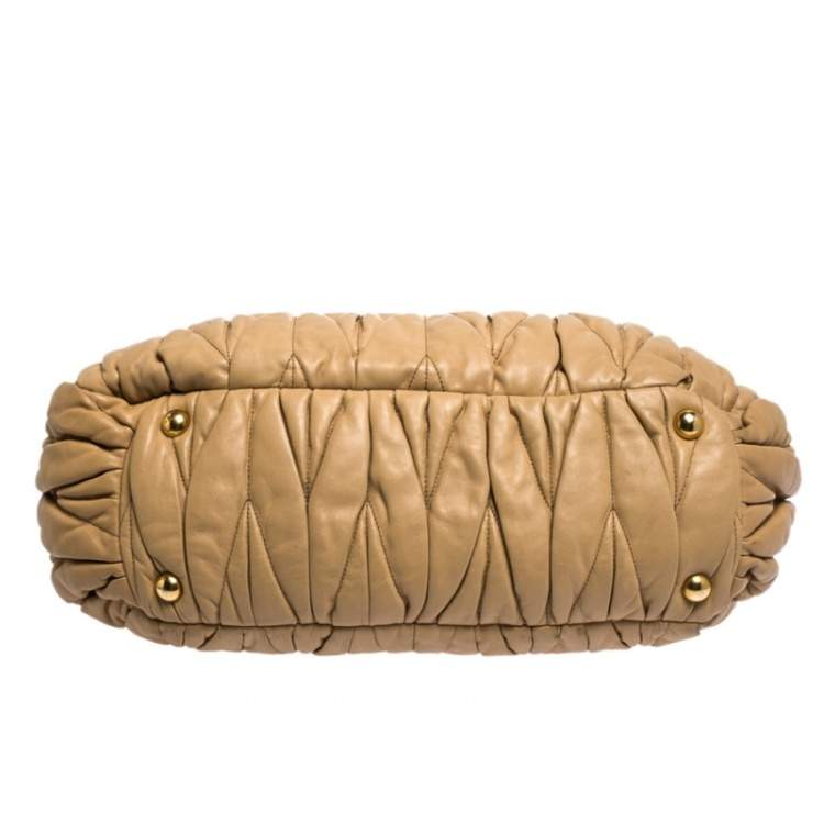 Pre Owned Miu Miu Beige Matelasse Leather Turnlock Top Handle Bag