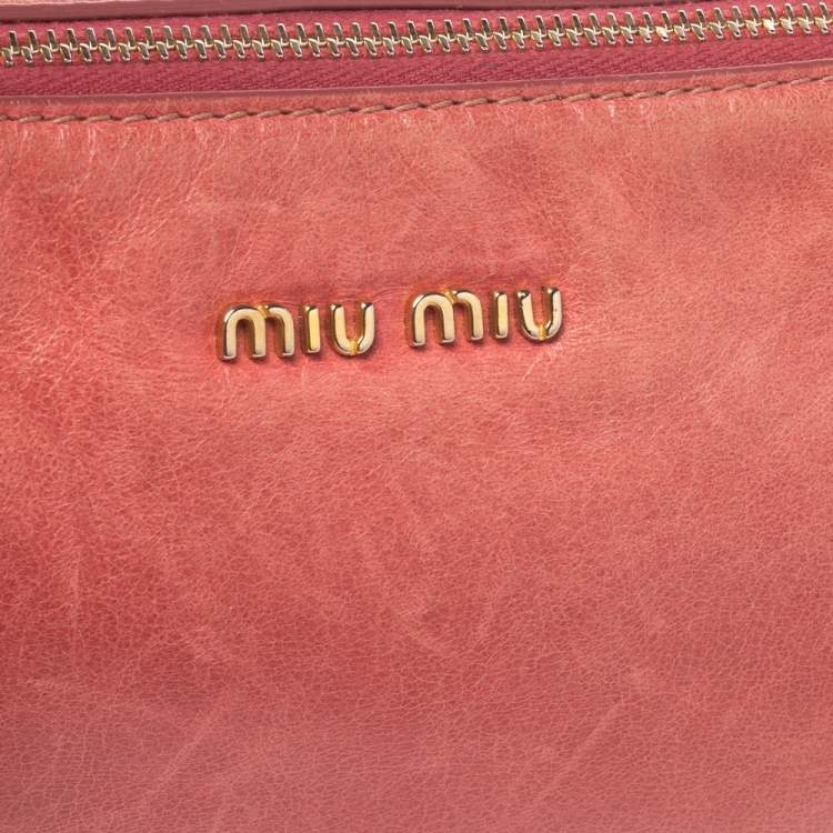 Pre Owned Miu Miu Peach Vitello Lux Leather Pochette Bag