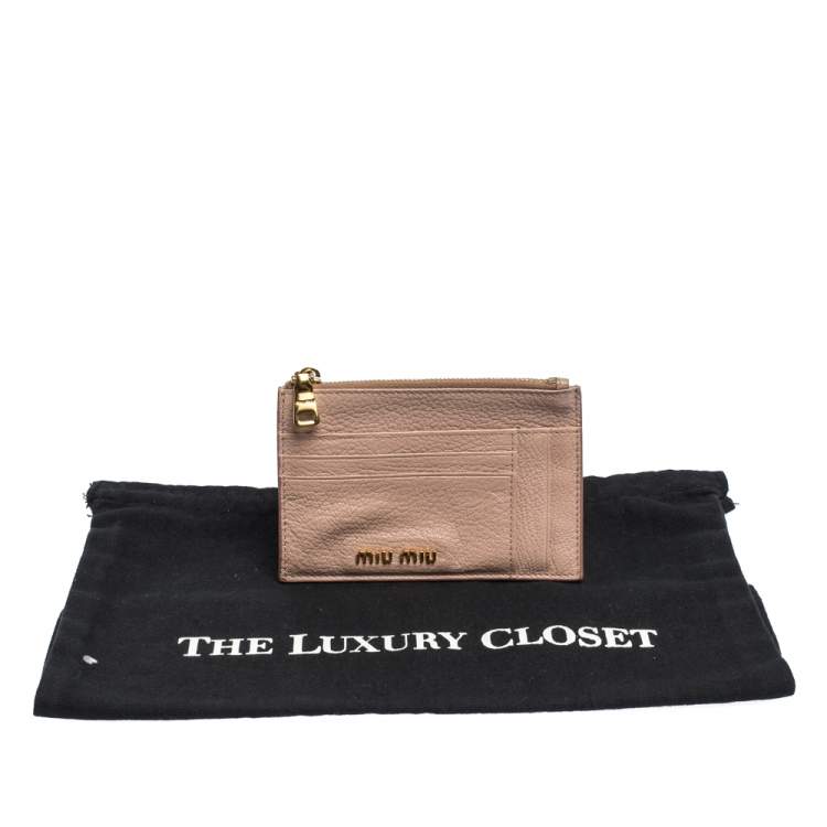 Pre Owned Miu Miu Light Pink Leather Madras Zip Wallet