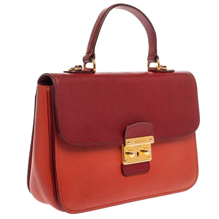 Pre Owned Miu Miu Orange/Red Madras Leather Push Lock Flap Top Handle Bag