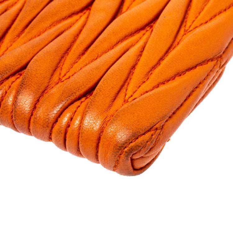 Pre Owned Miu Miu Orange Matelassé Leather Zip Pouch