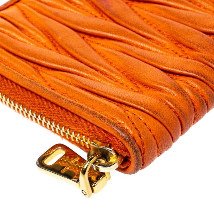 Pre Owned Miu Miu Orange Matelassé Leather Zip Pouch