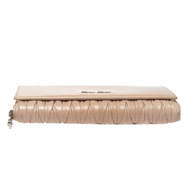 Pre Owned Miu Miu Beige Matelassé Leather Continental Wallet
