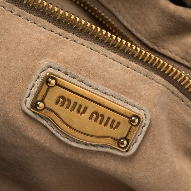 Pre Owned Miu Miu Tan/Beige Leopard Print Calfhair and Leather Flap Hobo 