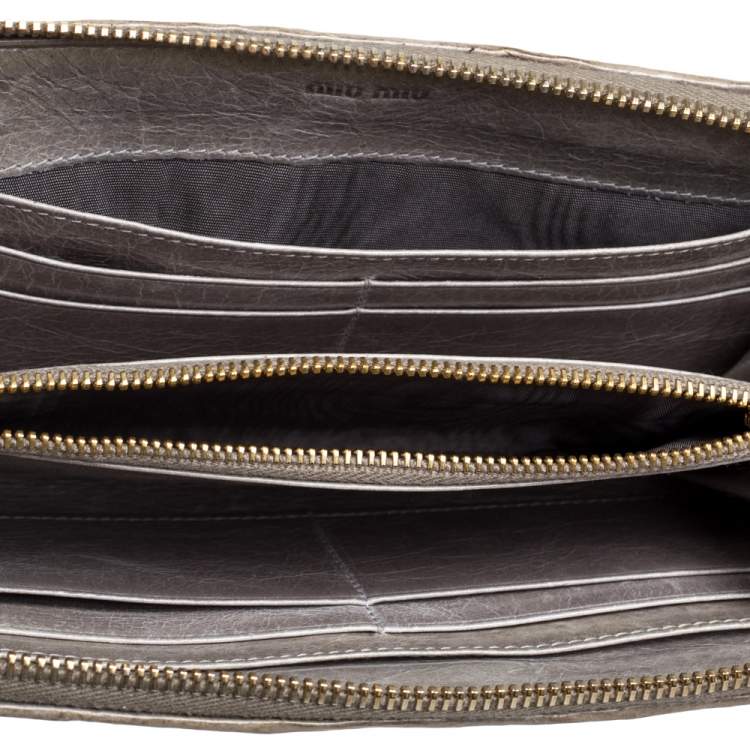 Pre Owned Miu Miu Avocado Green Matelassé Leather Zip Around Wallet