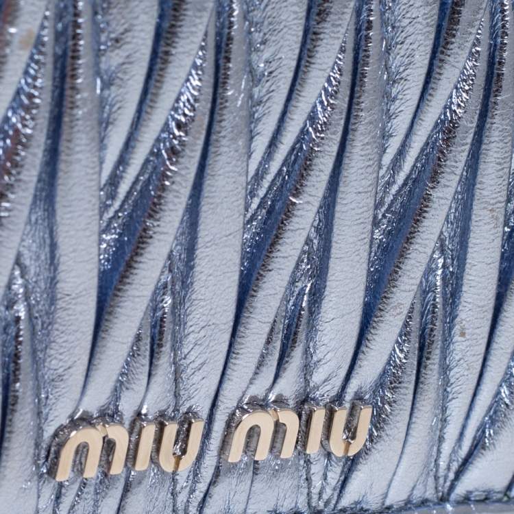 Pre Owned Miu Miu Metallic Blue Matelassé Leather Flap Compact Wallet