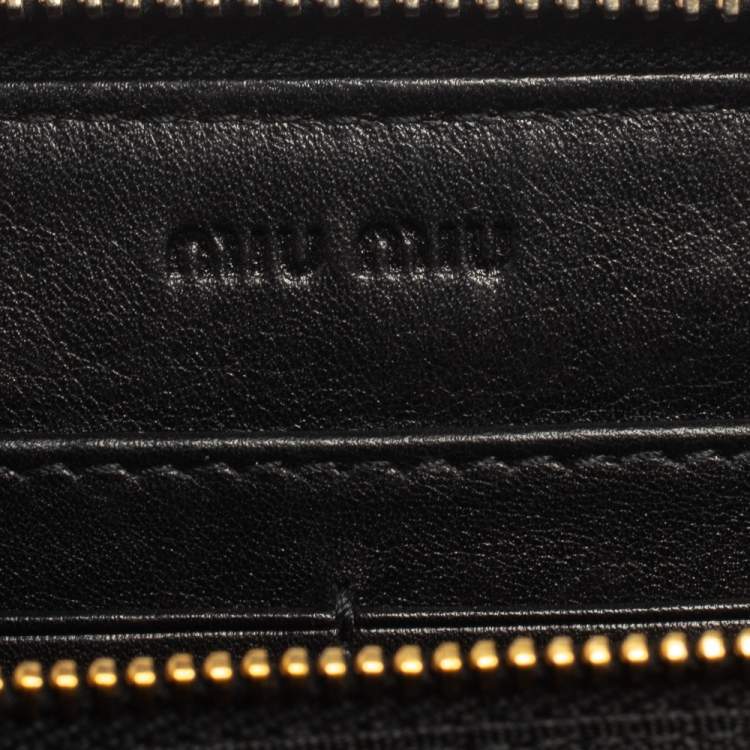 Pre Owned Miu Miu Black Leather Studded Zip Around Wallet