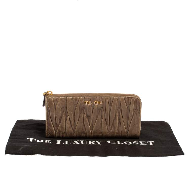 Pre Owned Miu Miu Dark Beige Matelassé Leather Zip Around Continental Wallet