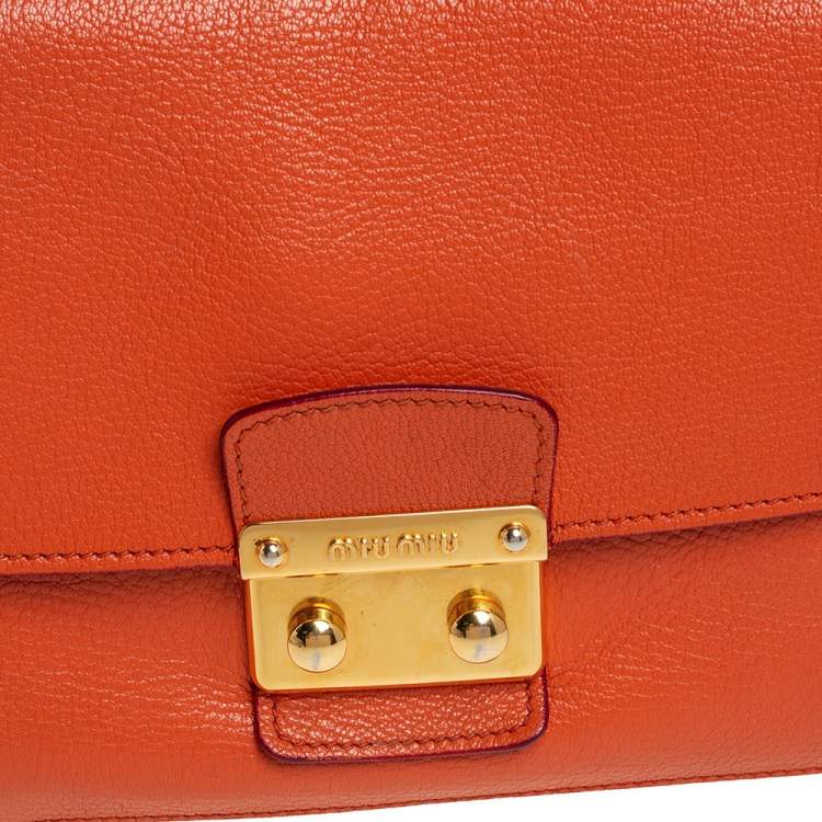 Pre Owned Miu Miu Orange Madras Leather Push Lock Flap Top Handle Bag