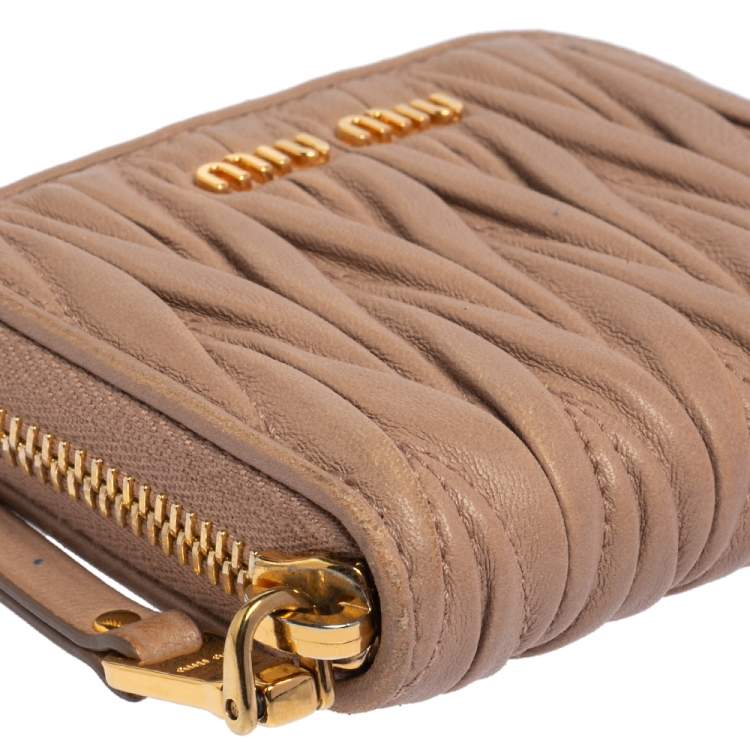 Pre Owned Miu Miu Dusty Pink Matelassé Leather Zip Around Compact Wallet