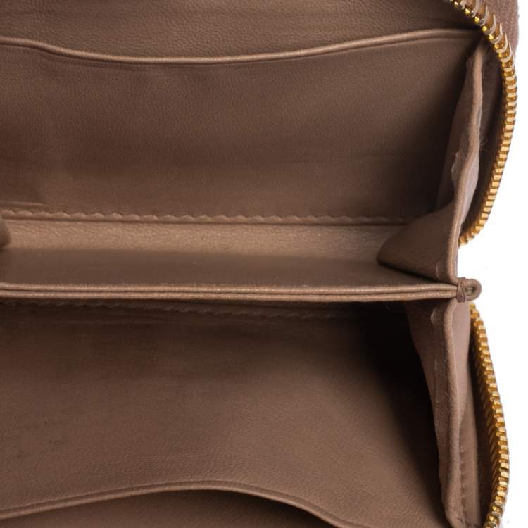 Pre Owned Miu Miu Dusty Pink Matelassé Leather Zip Around Compact Wallet