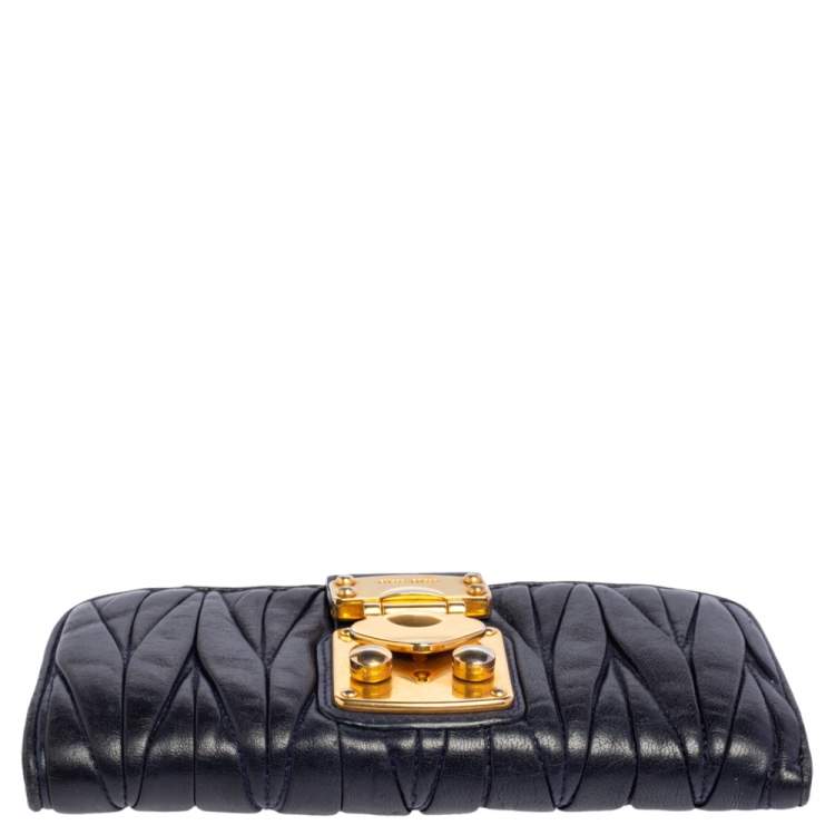 Pre Owned Miu Miu Navy Blue Matelassé Leather Clasp Lock Continental Wallet