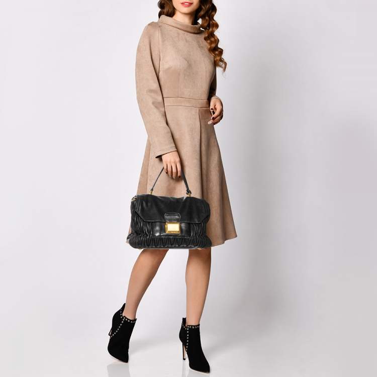 Pre Owned Miu Miu Black Matelassé Leather Push Lock Top Handle Bag