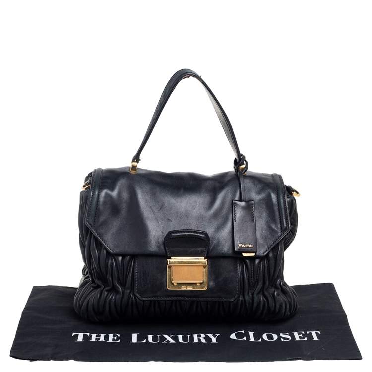 Pre Owned Miu Miu Black Matelassé Leather Push Lock Top Handle Bag