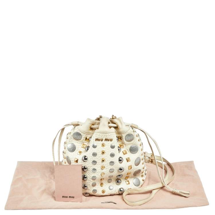 Pre Owned Miu Miu Off White Leather Studded Drawstring Bucket Bag