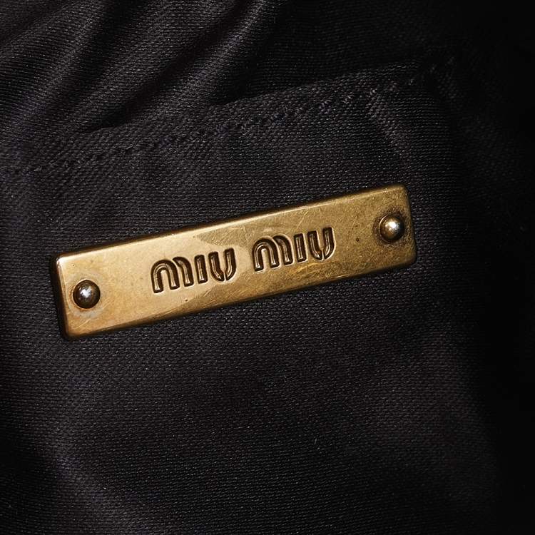Pre Owned Miu Miu Off White Leather Studded Drawstring Bucket Bag